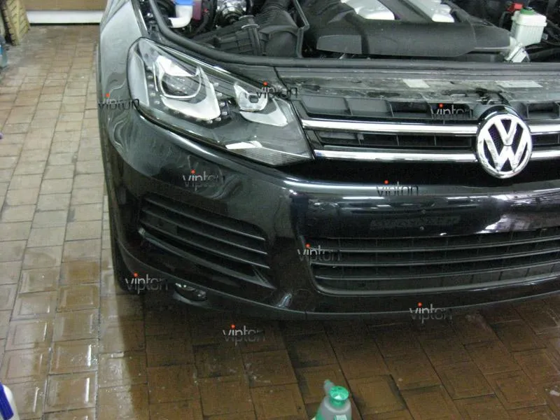 Автомобиль Volkswagen Touareg. / Нанесение антигравийной пленки VENTURESHIELD. 3 Автомобиль Volkswagen Touareg. / Нанесение антигравийной пленки VENTURESHIELD. 3