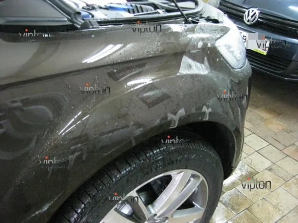 Audi Q7: нанесение антигравийной пленки VENTURESHIELD 9 Audi Q7: нанесение антигравийной пленки VENTURESHIELD 9